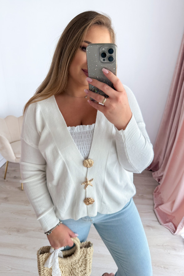 Sweter z odpinanymi broszkami Arielle - kremowy 1